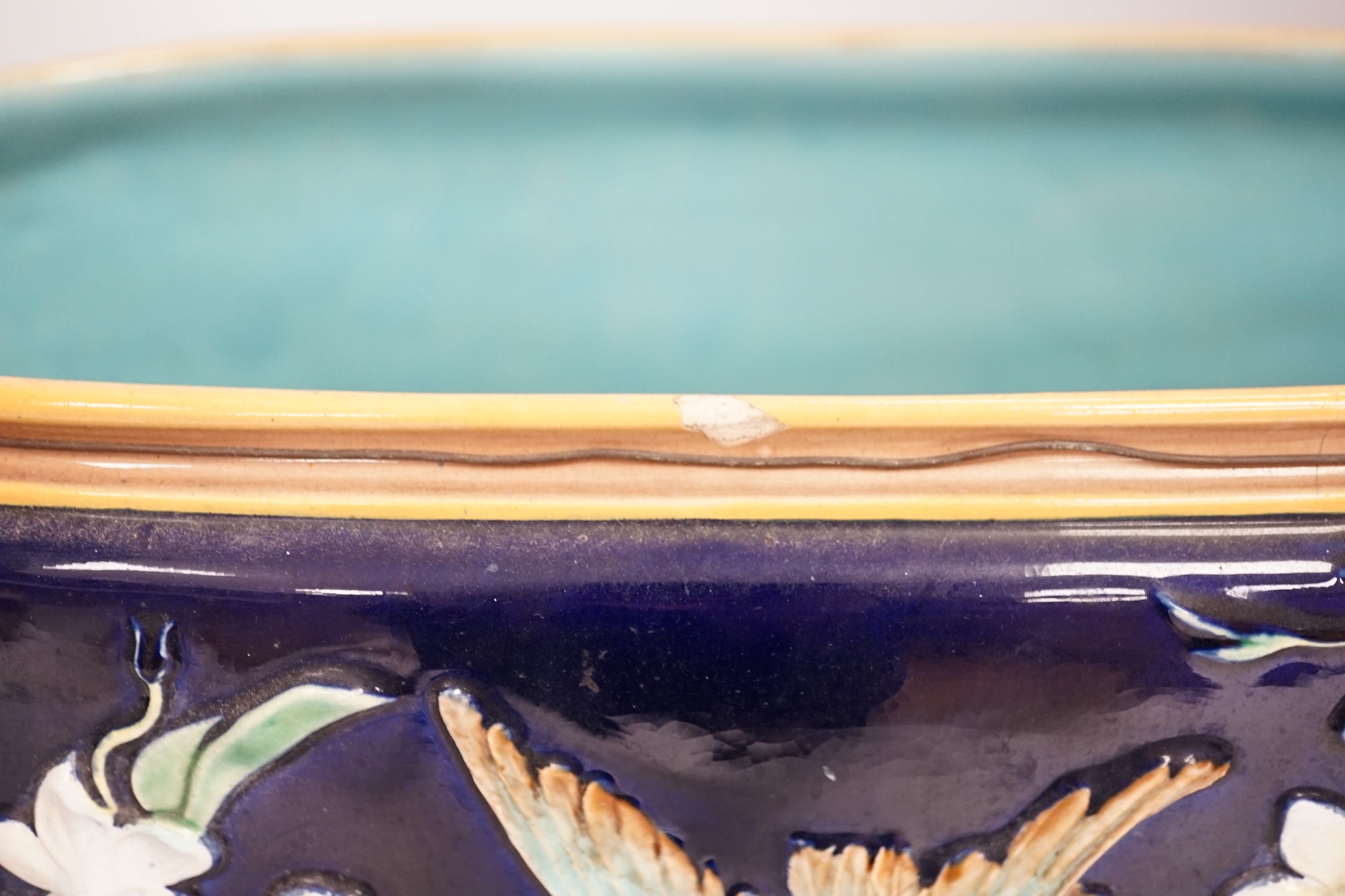 A George Jones ‘Hummingbird ’ majolica jardiniere / planter, 37cm long. Condition - poor